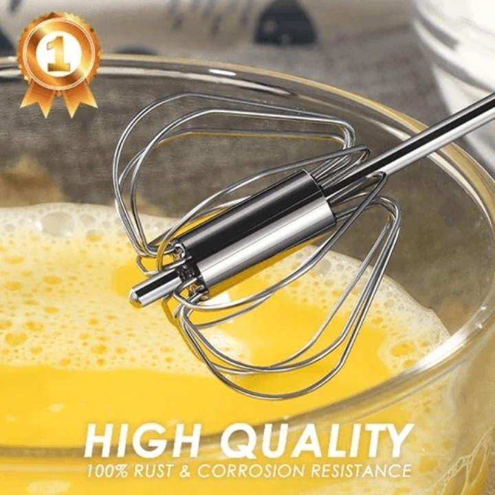 Durable stainless steel egg beater for manual mixing in the kitchen