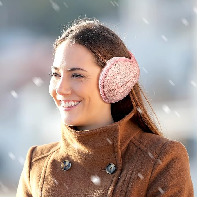 Person enjoying outdoor winter activities wearing warm, foldable knitted ear warmers. Ultimate cold weather comfort.