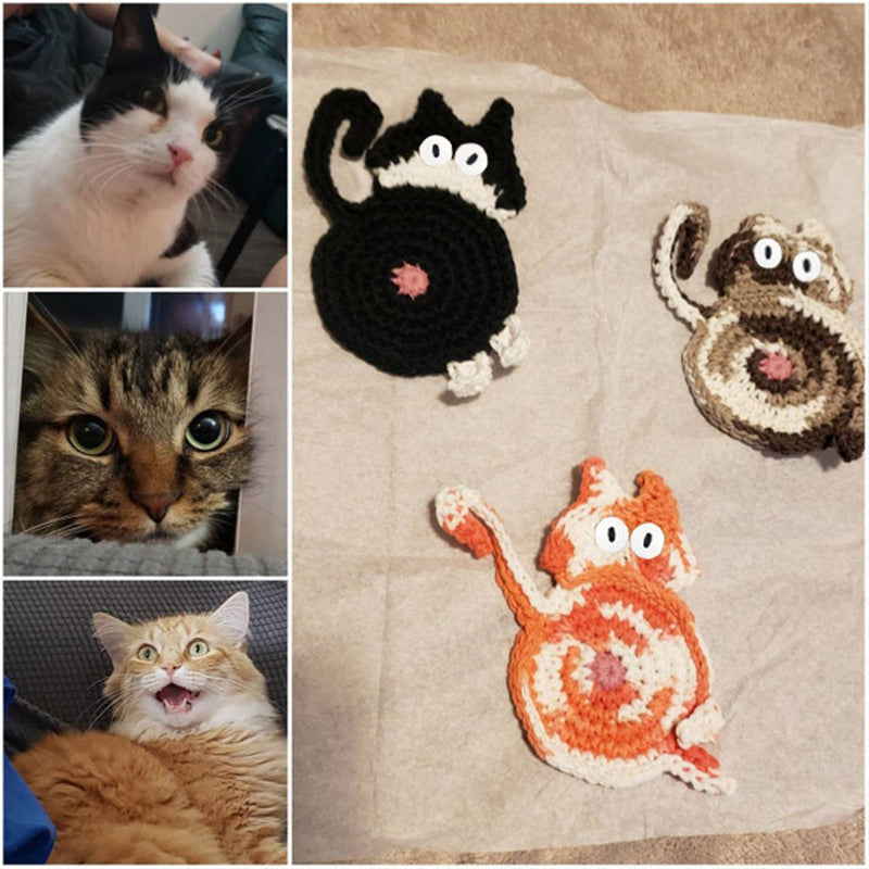 Colorful cat butt coasters displayed on a wooden table, perfect for home decor & animal lovers.
