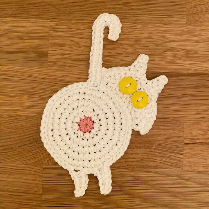 Four different colored cat butt coasters, a funny gift idea for friends and family.