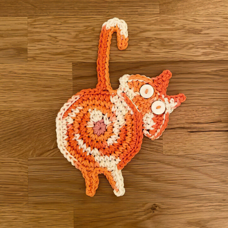 Stack of charming cat butt drink coasters, ideal unique gift for any cat owner.