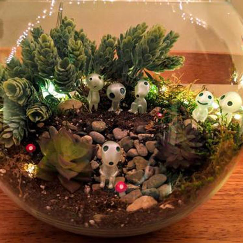 Assorted glowing resin elf figures, creating a magical touch for fairy gardens or desk decoration