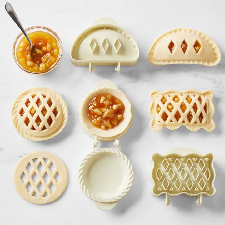 Open mini hand pie mold showing crimping edges, ready for making small, sealed turnovers or empanadas
