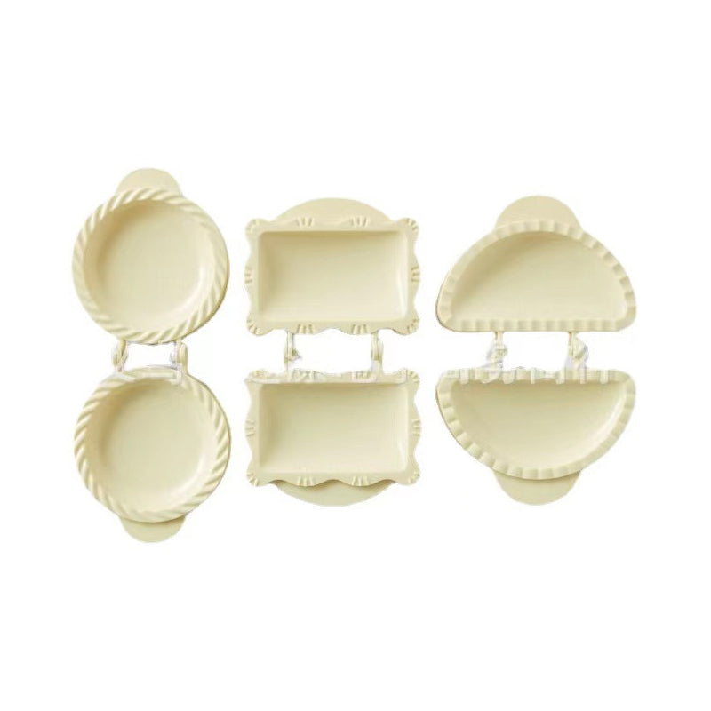 Child's hands using a mini pie mold to cut and seal dough for a fun and easy baking activity