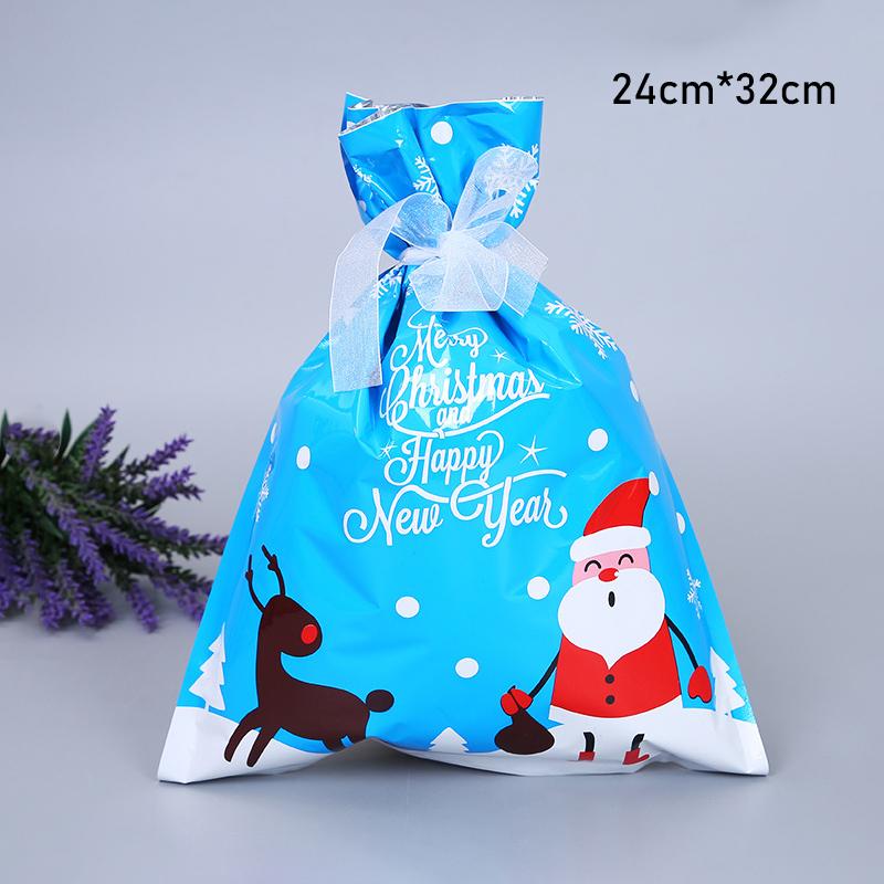 Reusable Christmas gift bags hanging from a mantlepiece, adding a festive touch to holiday decorations, party