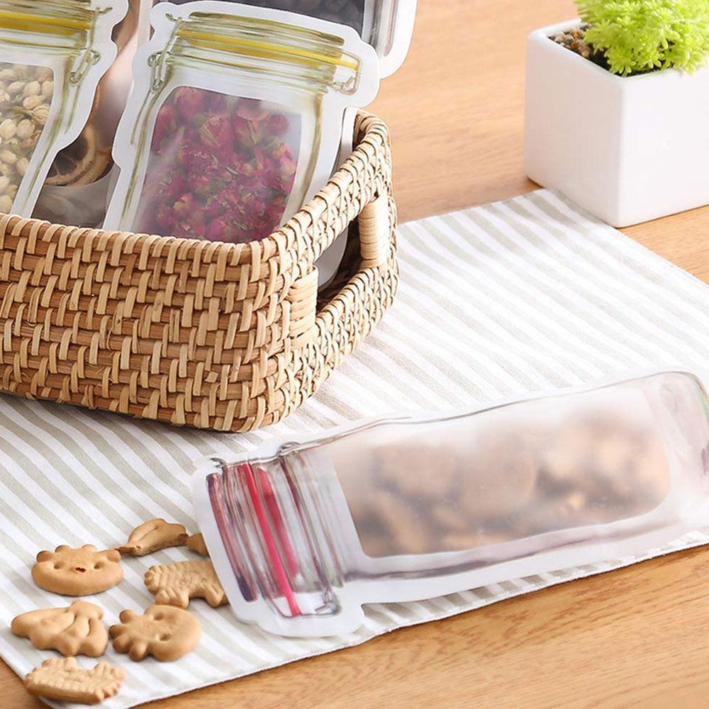 Reusable, BPA-free snack and lunch bags designed as mason jars, perfect for sustainable food storage solutions.
