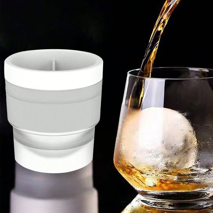 Stackable circular ice ball molds in use, filled with water and ready for freezing for refreshing drinks.