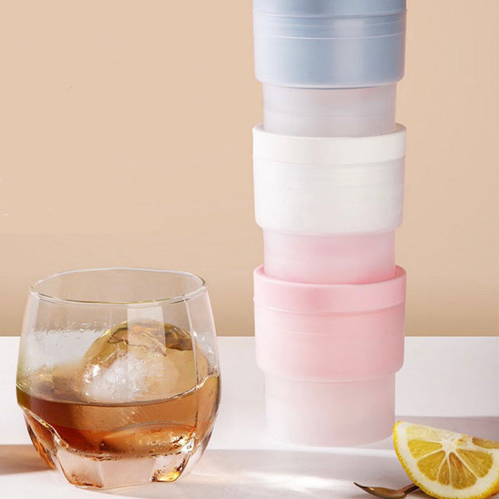 Arrangement of multiple stackable sphere ice molds, showcasing their compact and space-saving design.