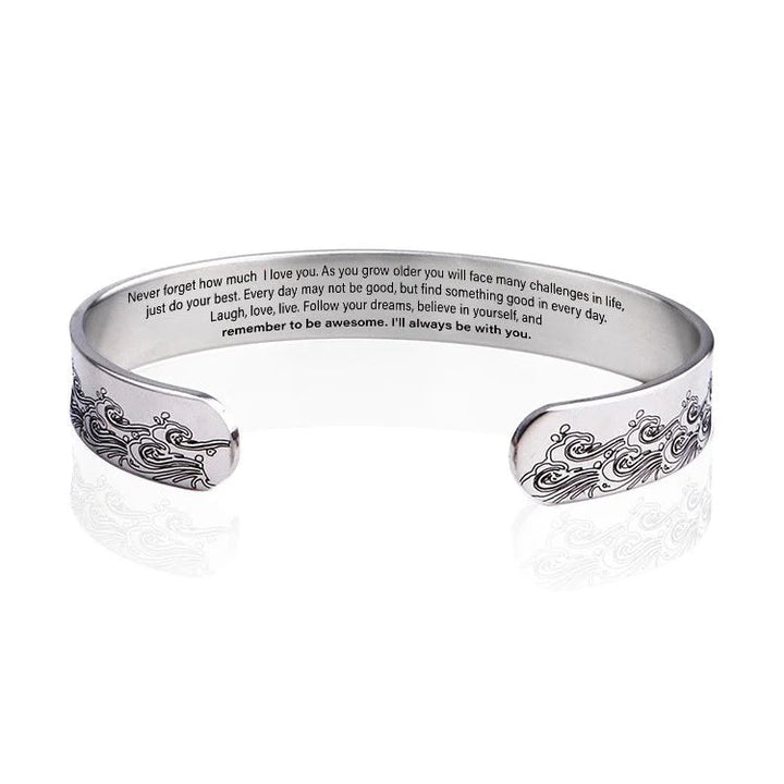 Granddaughter stainless steel cuff bracelet displayed on a gift box, ready for presentation