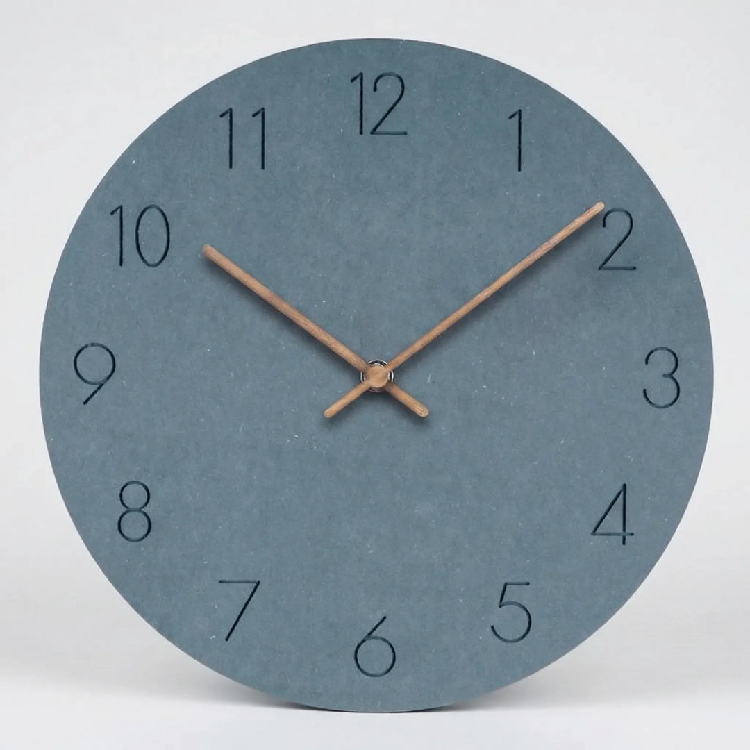 Modern silent wall clock, clean minimalist round shape, perfect for any room decor.