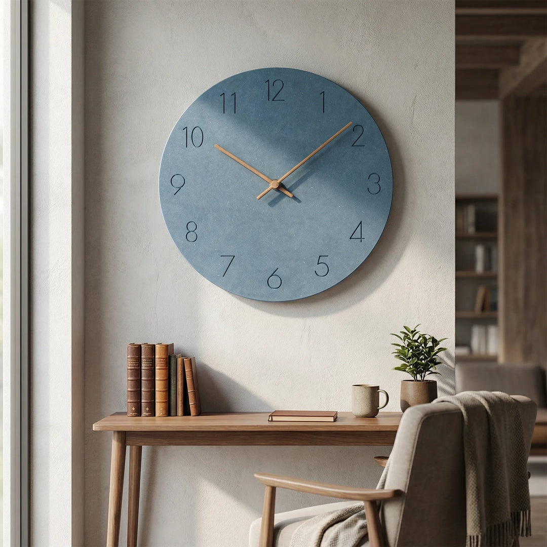 Minimalist analog wall clock, silent operation, elegant round design for modern spaces.