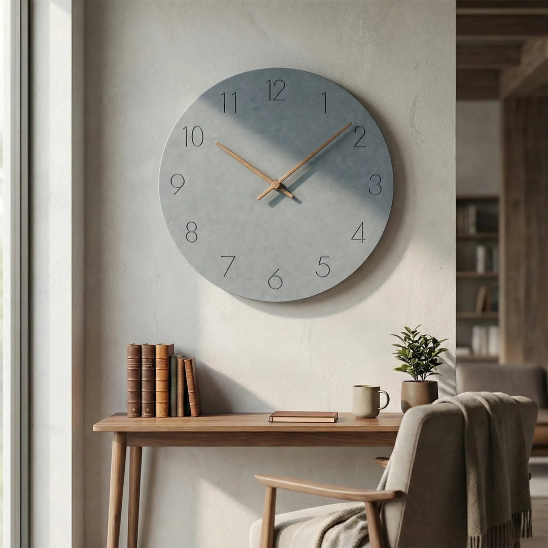 Sleek minimalist wall clock, silent mechanism, round shape, perfect for a peaceful office.