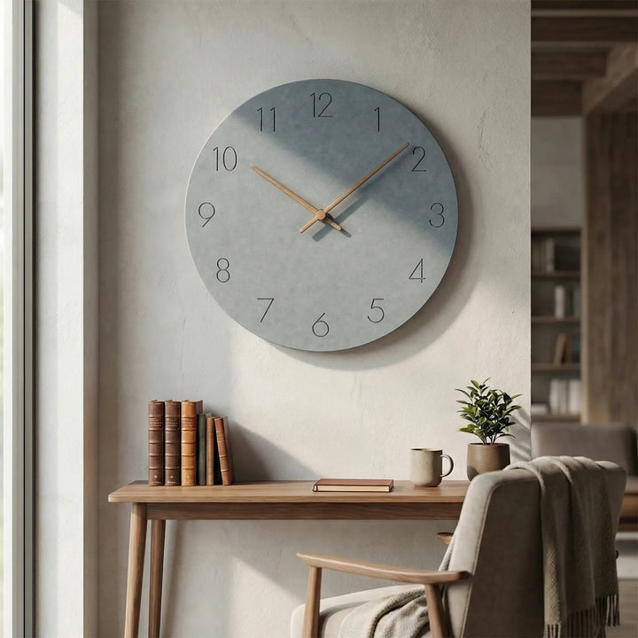 Sleek minimalist wall clock, silent mechanism, round shape, perfect for a peaceful office.