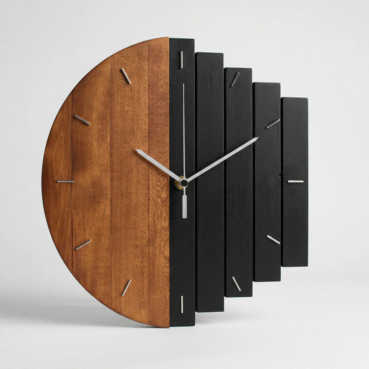 Two-tone silent round wall clock featuring unique half-plank wood design; stylish modern home accent.
