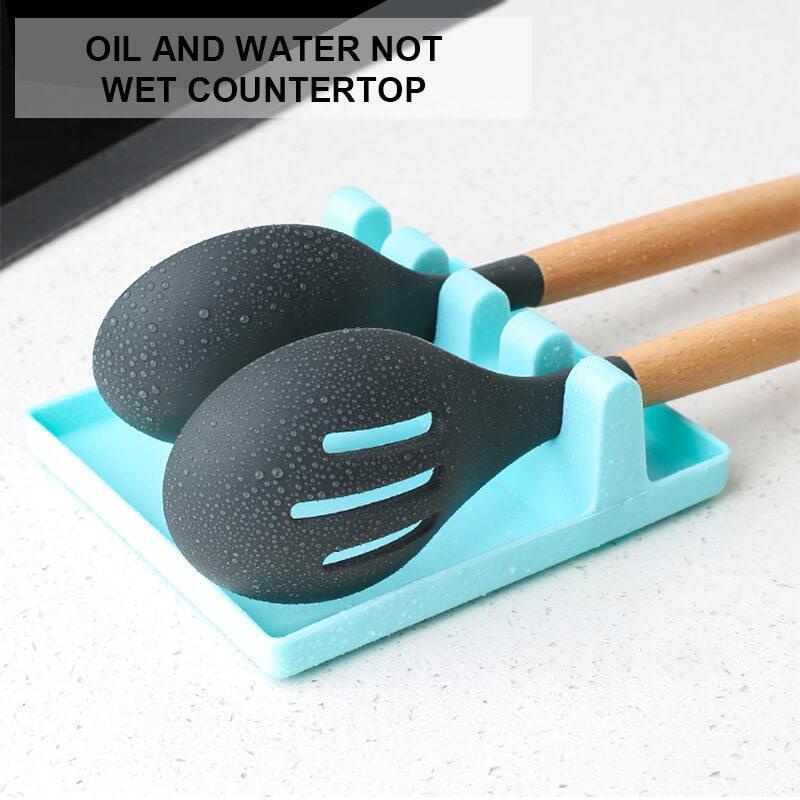 Practical gray silicone utensil rest for kitchen, ideal spatula holder for messy cooking tasks
