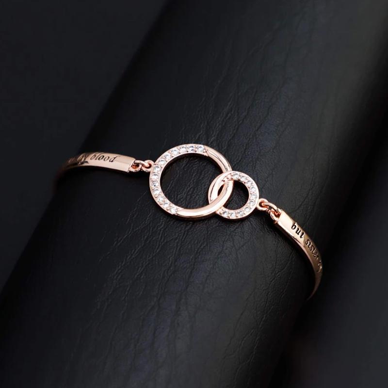 Detail view of a silver adjustable bracelet charm, 'True Friend' engraved, an ideal women's birthday gift.