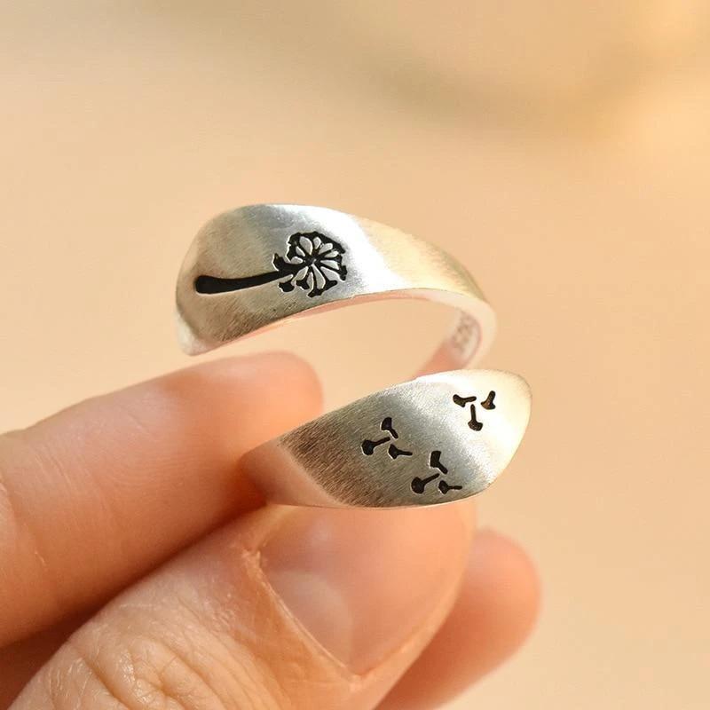 Nature-inspired adjustable ring with detailed dandelion art, a stylish jewelry piece