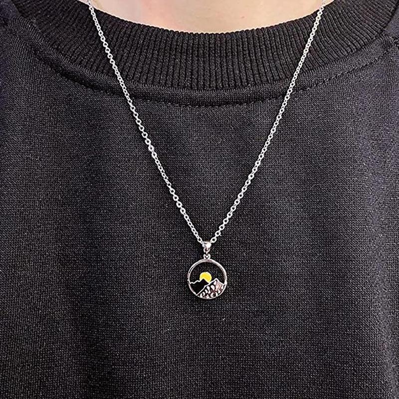 Elegant mountain design couple necklace in silver, a stylish and nature-inspired jewelry piece.