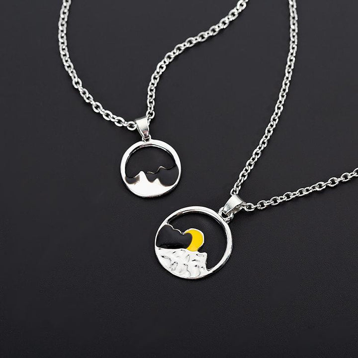Two silver mountain outline necklaces, a perfect matching set for couples, nature-themed.