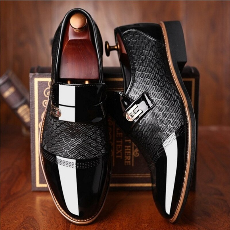 Sleek black high-shine men's dress shoes with elegant buckles, perfect for formal events & business wear.