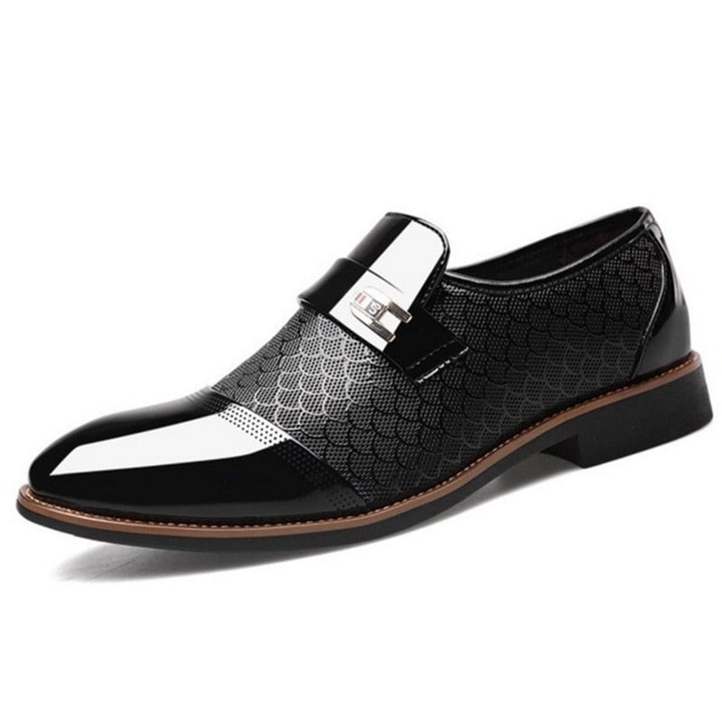 Sleek brown high-shine men's dress shoes with stylish buckles, a timeless choice for formal occasions.