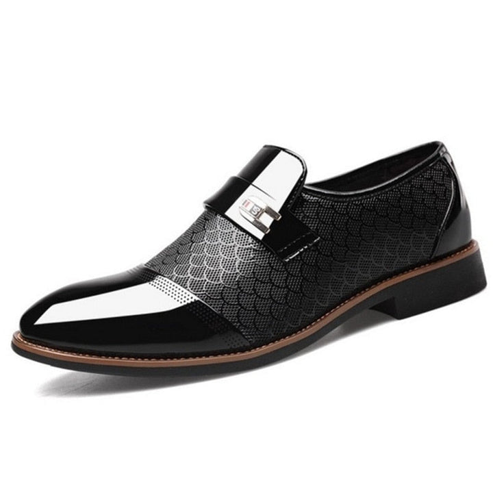 Sleek brown high-shine men's dress shoes with stylish buckles, a timeless choice for formal occasions.