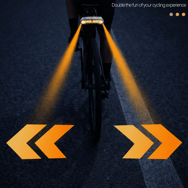 Smart bicycle rear light securely mounted on bike, displaying its alarm & safety features. USB rechargeable.
