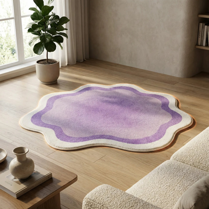 Vibrant gradient accent rug, soft & plush, with wave design. Enhances bedroom or living room with modern decor.