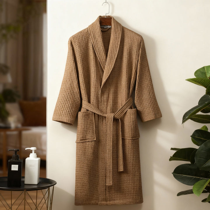 Woman relaxing in a cozy grey waffle knit robe, perfect gift for homewear