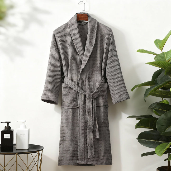Comfortable women's waffle knit sleepwear robe in a light blue color, spring essential