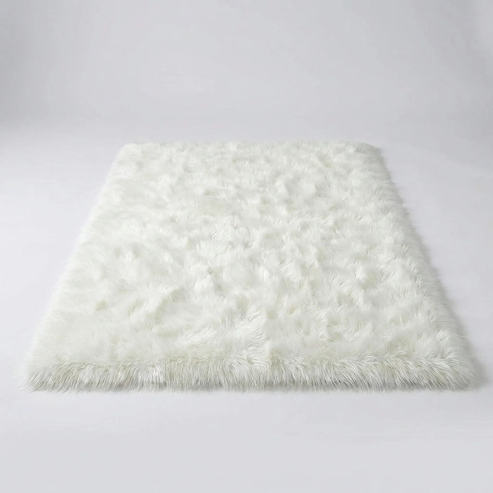 Cozy bedroom rug with a soft plush texture and elegant Flowique wavy design for comfort.