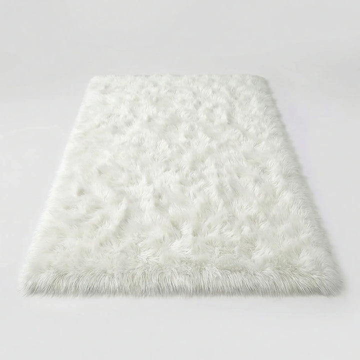 Luxurious soft plush floor covering, perfect for adding comfort to any living space.