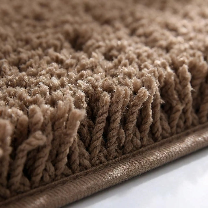 Luxurious Flowique plush bathroom rug in rectangular shape with elegant wave pattern. Soft, absorbent, & home decor.