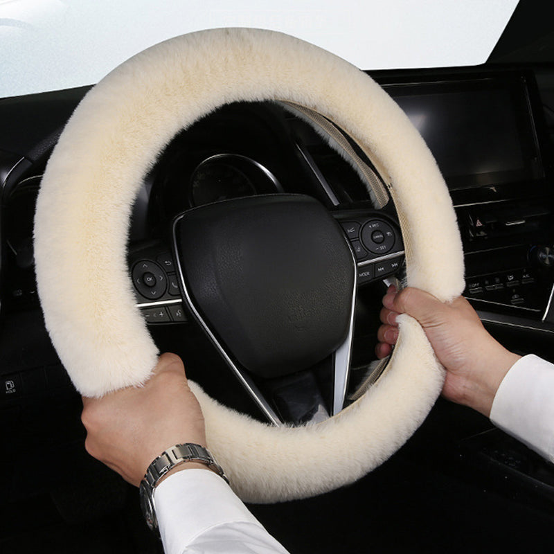 Luxurious black plush steering wheel cover, enhancing car interior and comfort