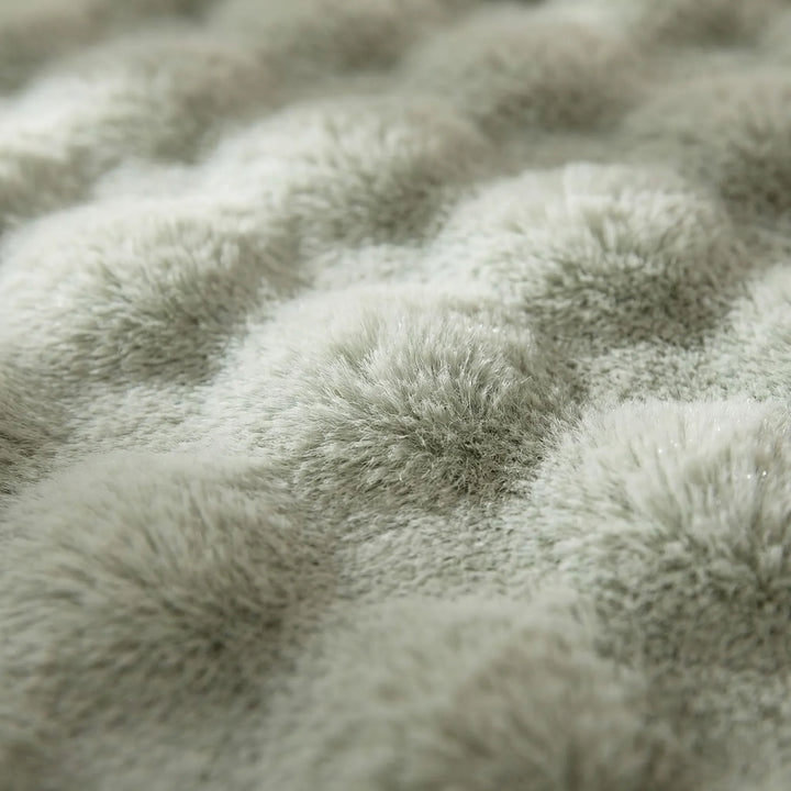Cozy non-slip textured area rug, plush and soft, adds warmth and style to any living room or bedroom.