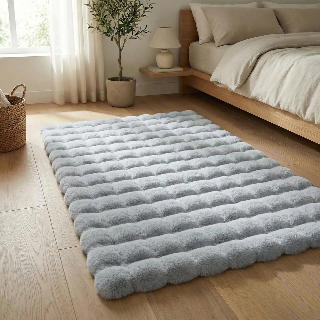 Statement floor rug: Plush textured area rug with elegant waves, non-slip and washable for cozy living.