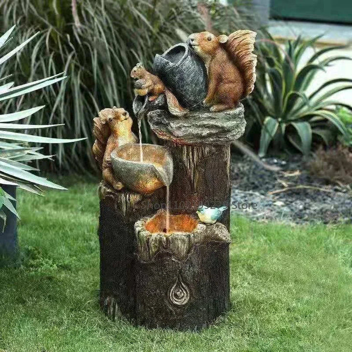 Wildlife solar fountain featuring playful duck & squirrel statues. LED light for sustainable garden & balcony decor.
