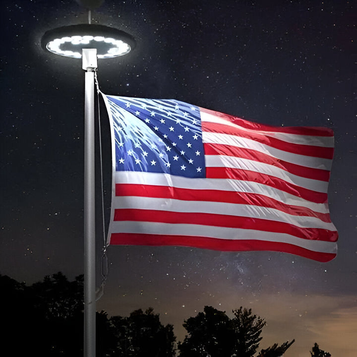 Solar LED flagpole light automatically illuminates flags from dusk to dawn. Bright outdoor flag display.