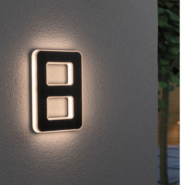 Stylish illuminated house number, solar-powered for easy installation.