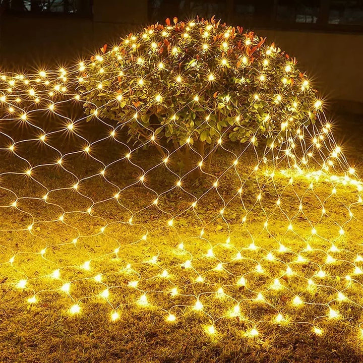Waterproof LED mesh lights illuminating a patio area, great for party and Christmas decor