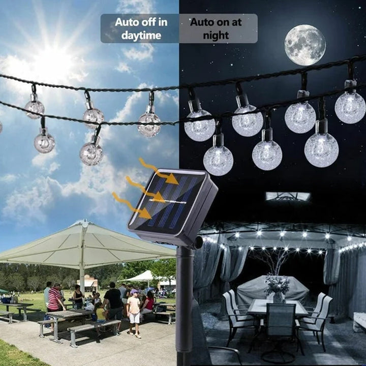 Warm white LED solar string lights enhancing a garden space, perfect for evening ambiance