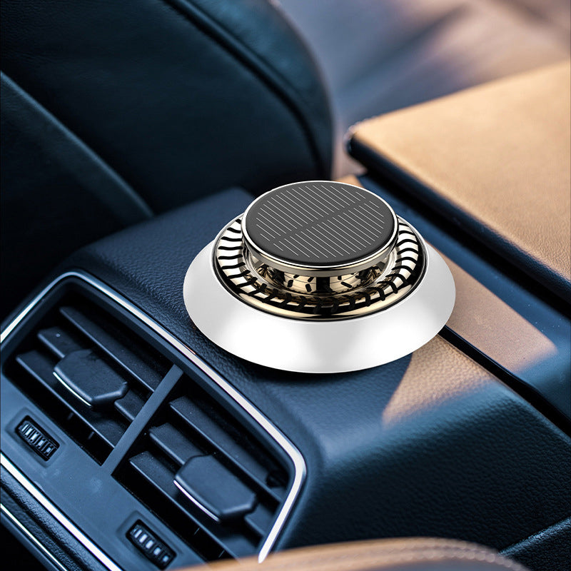 Unisex black solar rotating car aromatherapy diffuser, perfect for daily commutes
