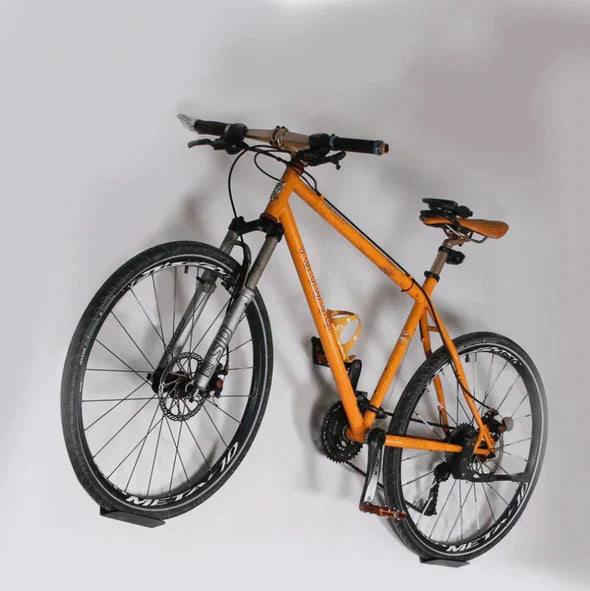 Easy install wall mount bike hanger, ideal for space-saving bicycle storage and garage organization.
