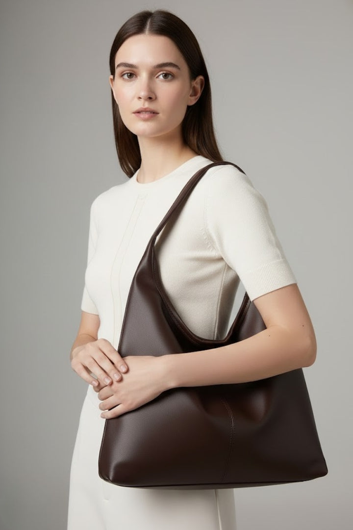 Classic black women's tote bag, spacious & versatile, perfect for everyday fashion.