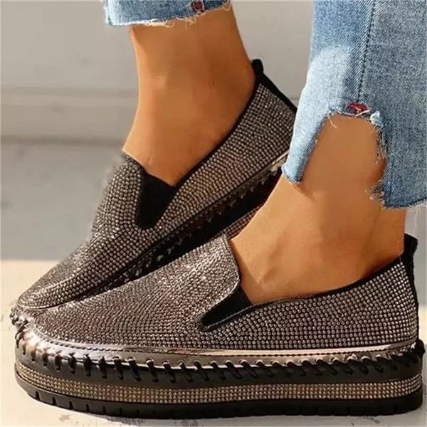 Sparkling women's slip-on shoes for elegant comfort, perfect for parties & everyday glamour. Easy wear footwear.