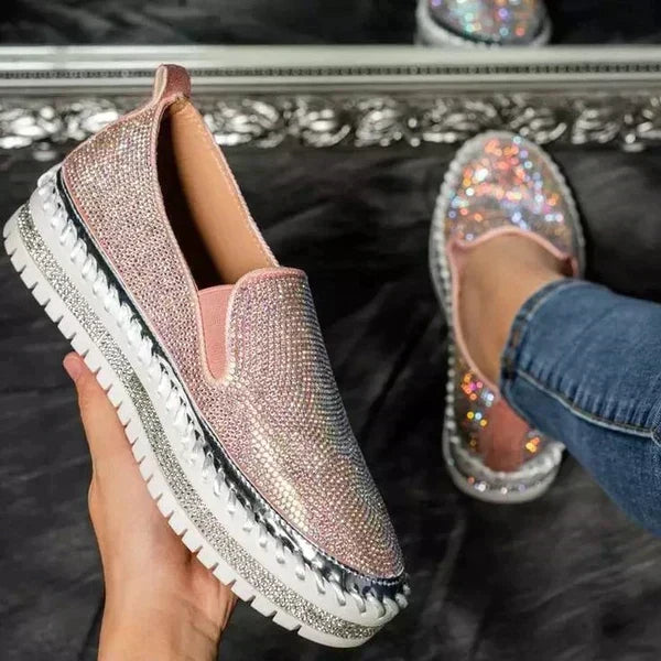 Glamorous women's sparkling slip-on shoes, offering elegant comfort for parties & casual wear. Easy to slip on.