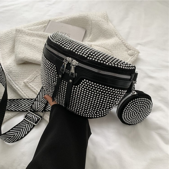 Close-up of a women's rhinestone PU leather waist bag with zipper detail