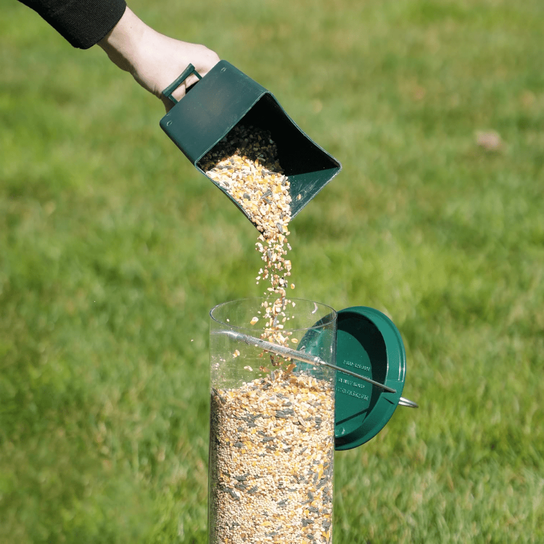 Attractive garden decor birdhouse, weatherproof hanging feeder. Squirrel-proof design with rotating perch for garden birds.