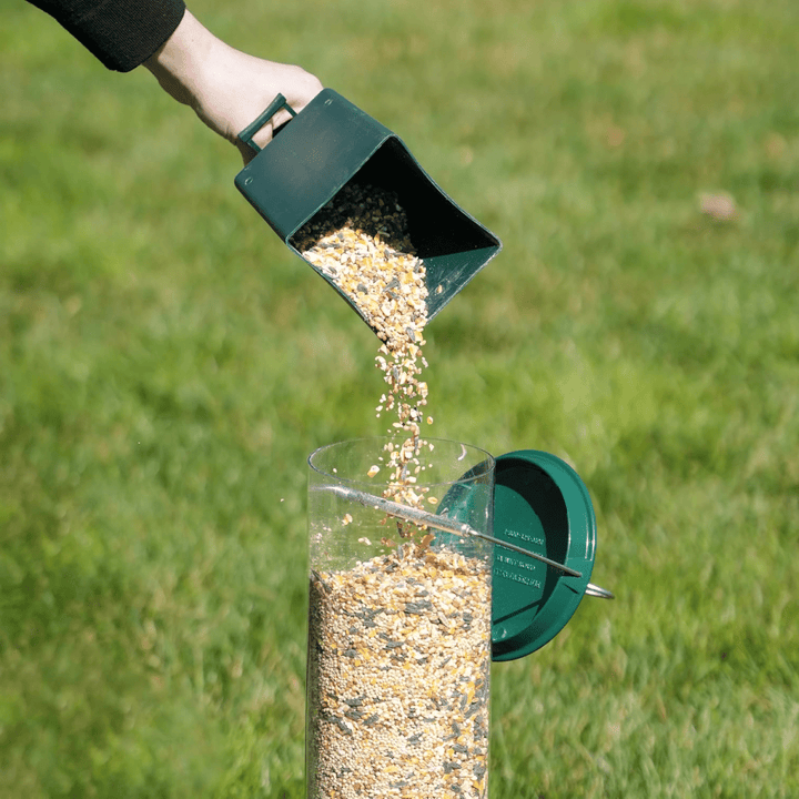 Attractive garden decor birdhouse, weatherproof hanging feeder. Squirrel-proof design with rotating perch for garden birds.