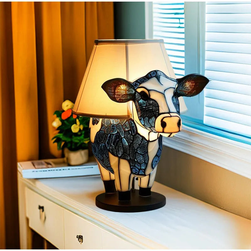 Unique stained glass animal table lamp adding a warm glow to your home decor.